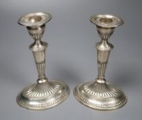 A pair of late Victorian silver oval candlesticks, Thomas Bradbury & Sons, London, 1896, weighted,