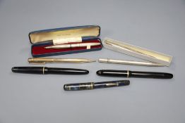 A Yard-o-lead, two silver and five other pens