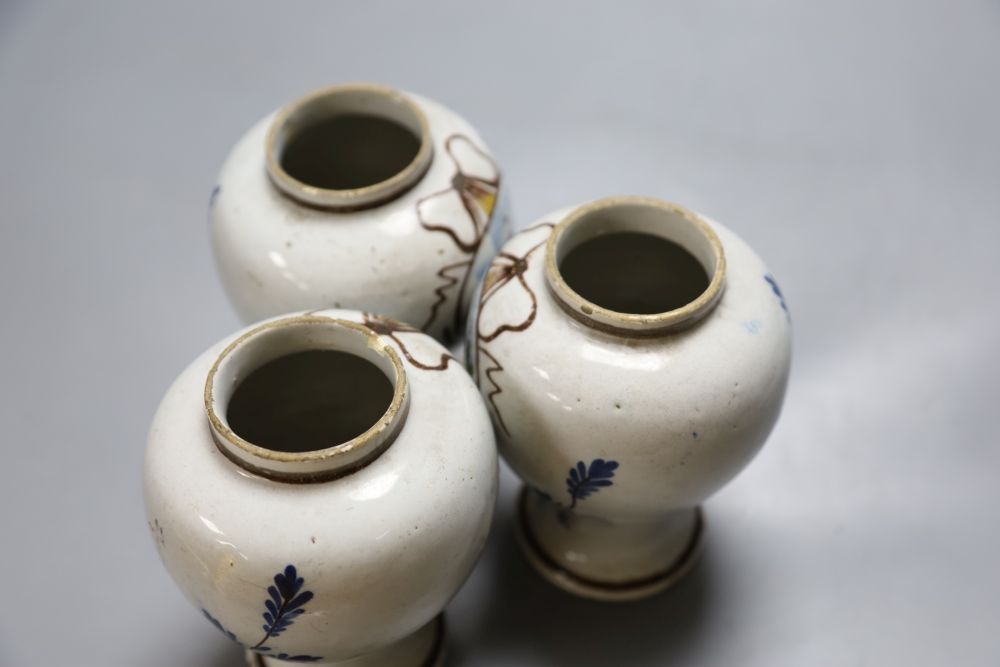 A set of three 19th century Dutch delft baluster jars, painted in colours, 14cmCONDITION: One jar - Image 4 of 4