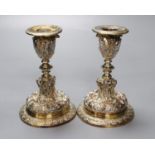 A pair of Elkington electrotype cast plated candlesticks, height 14cm