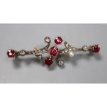A yellow and white metal, ruby, diamond and seed pearl scrolling bar brooch (pearl missing), 46mm,