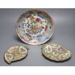 A Chinese enamelled porcelain saucer dish, 25cm, and two Canton leaf dishes, 19cm and 18cm