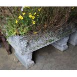 A reconstituted stone rectangular garden planter on trestle stand, length 92cm height 58cm