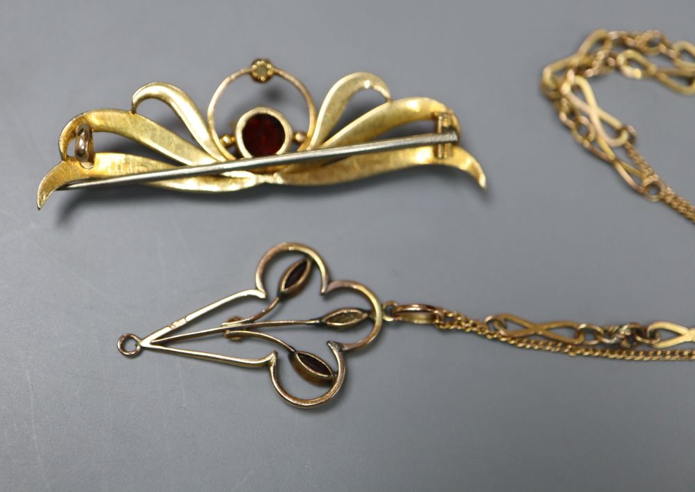 A 15ct, garnet and seed set brooch, 46mm, gross 4.3 grams and a 9ct pendant on a yellow metal - Image 2 of 2