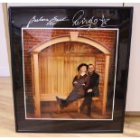 Ringo Starr and Barbara Bach, a signed photograph, " What time is the next bus?', 55 x 50cm