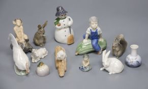 A collection of Royal Copenhagen including mice, chickens, rabbits, a snowman and a dish