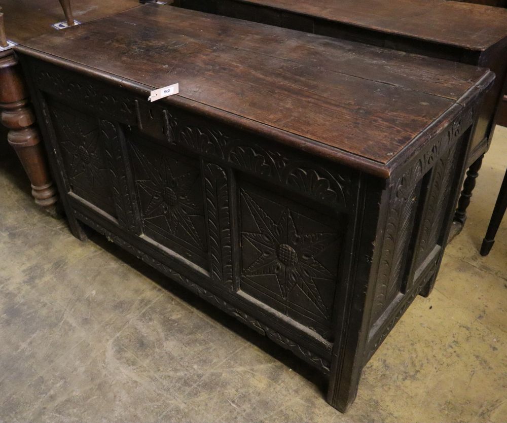 An early 18th century oak coffer, width 125cm depth 57cm height 76cm