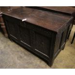 An early 18th century oak coffer, width 125cm depth 57cm height 76cm