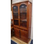 A Chinese hardwood cabinet, width 92cm, depth 35cm, height 183cm