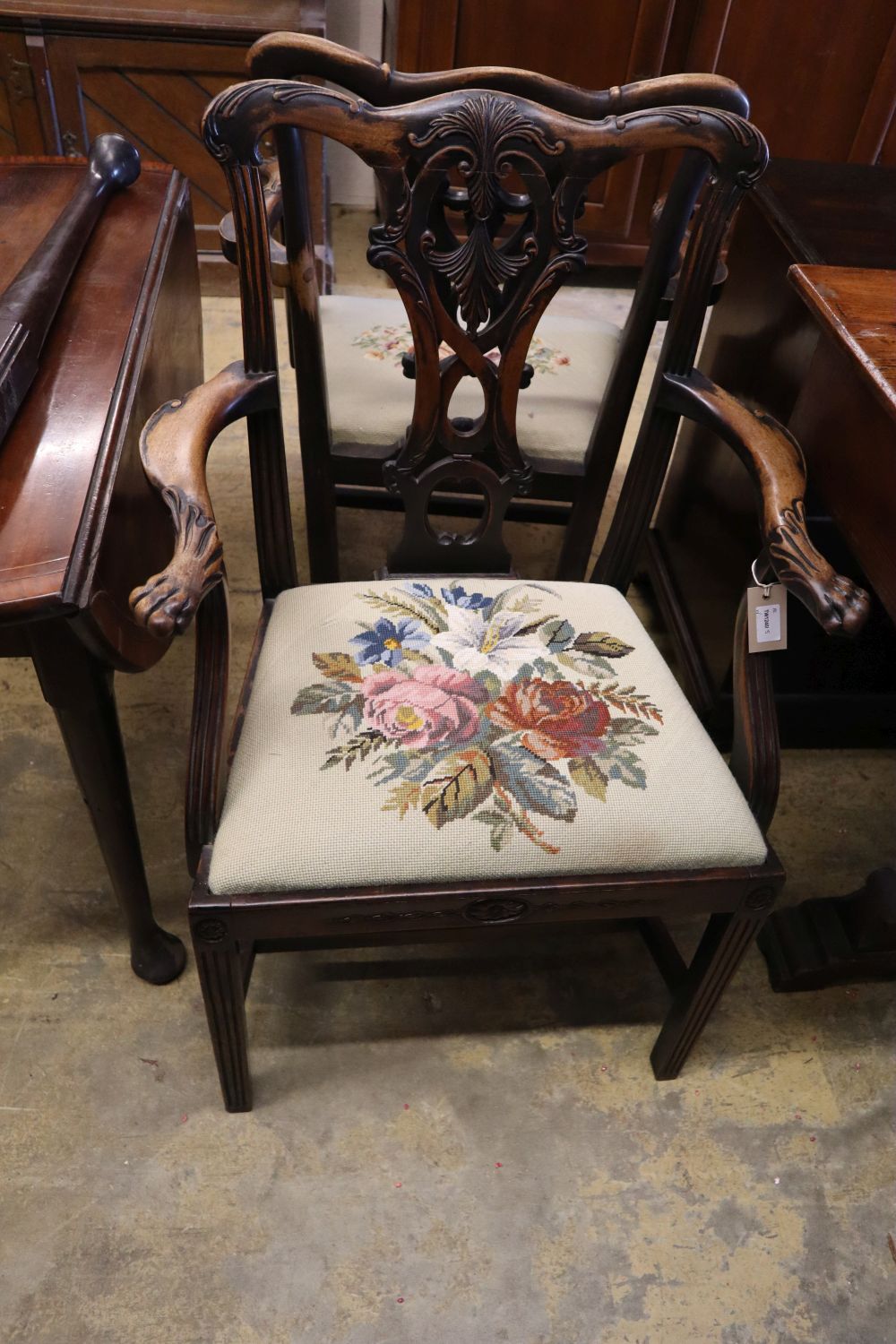 A pair of 19th century mahogany elbow chairs, scroll and leaf-carved and with lion's paw armrests - Image 4 of 4