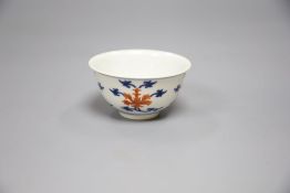 A Chinese underglaze blue and iron red tea bowl, height 4cm