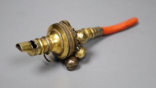 A George III silver gilt and coral set child's rattle, Matthew Chawner, London, 1806, 12.2cm,