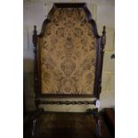 A 1920's mahogany firescreen, width 60cm, height 111cm