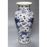 A Chinese porcelain baluster vase, painted with dragons and foliage, height 37cmCONDITION: Good
