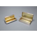 Two Victorian silver snuff boxes, one of shaped rectangular form with gilt interior, foliate-