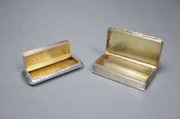 Two Victorian silver snuff boxes, one of shaped rectangular form with gilt interior, foliate-