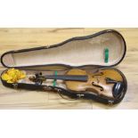 A late 19th century German 1/2 size violin bears label "Joseph Klotz Mittenwald", cased