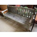 A weathered teak garden bench, length 79cm depth 60cm height 90cm