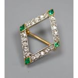 An early 20th century French yellow metal(18ct poincon mark), emerald and diamond set diamond shaped