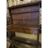 A late 18th century stripped pine dresser, width 182cm depth 50cm height 202cm