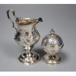 A George III silver inverted pear shaped cream jug, London, 1779 and a George III silver globe