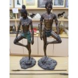 A pair of South African bronze figures, height 95cm