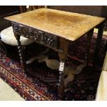 A 17th century and later carved oak side table with spiral-twist supports, width 86cm depth 59cm