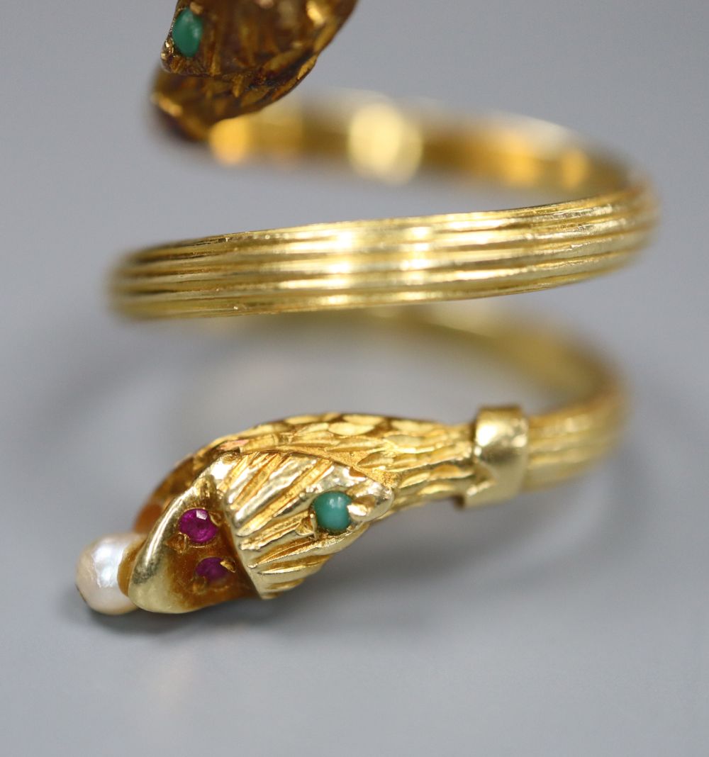 A Georgian style reeded yellow metal and gem set twin headed serpent ring, seed pear later added, - Image 2 of 3