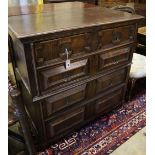 A late 17th century oak chest fitted four geometrically-moulded drawers on block feet, width 108cm