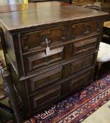 A late 17th century oak chest fitted four geometrically-moulded drawers on block feet, width 108cm