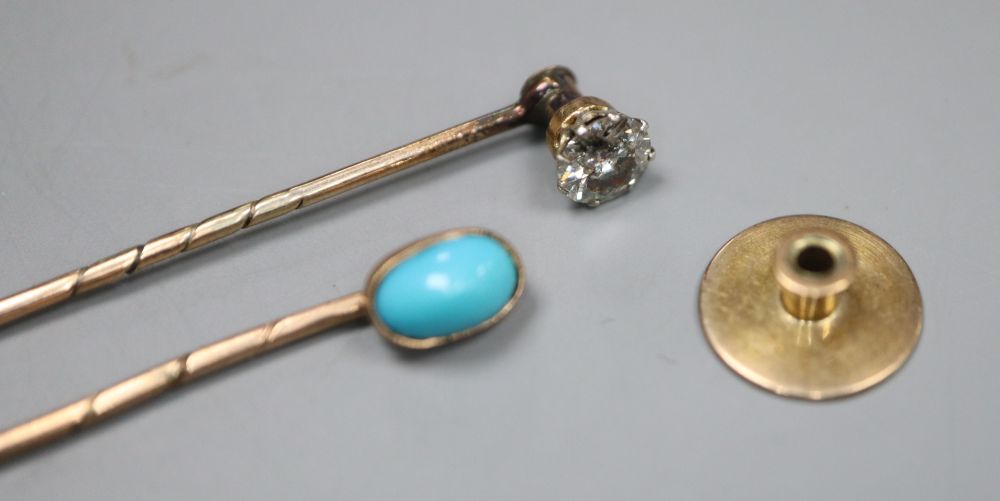 Two late Victorian sick pins- turquoise set and solitaire diamond set, longest 62mm, gross 2.5 grams