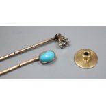 Two late Victorian sick pins- turquoise set and solitaire diamond set, longest 62mm, gross 2.5 grams