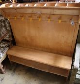 A "Community" furniture child's coat and shoe rack, length 125cm height 120cm