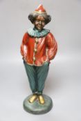 A modern painted bronze of a clown