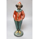 A modern painted bronze of a clown