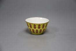 A Chinese yellow glazed 'shou' cup, Tongzhi mark but later, height 4cm