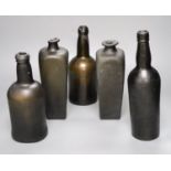 Five antique glass bottles, including two 18th century 'pig snout' gin bottles, two 18th century