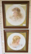 A pair of framed porcelain plaques of girls