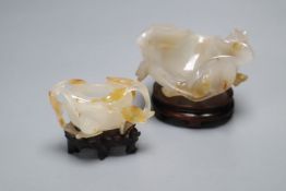 Two Chinese carved agate brushwashers on stands, largest 10cm