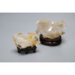 Two Chinese carved agate brushwashers on stands, largest 10cm