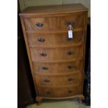 A reproduction walnut bow front six drawer chest, width 63cm depth 43cm height 123cm