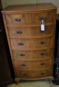 A reproduction walnut bow front six drawer chest, width 63cm depth 43cm height 123cm