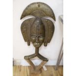 A large African tribal metal overlaid wood mask, length 90cm