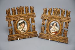 A pair of oval porcelain miniatures in carved frames, late 19th century, total height 17.5cm