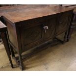 A Tudor style carved oak sideboard, width 119cm depth 36cm height 80cm