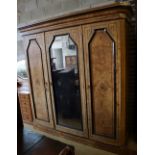 A late Victorian inlaid burr oak triple wardrobe, width 220cm depth 68cm height 221cm