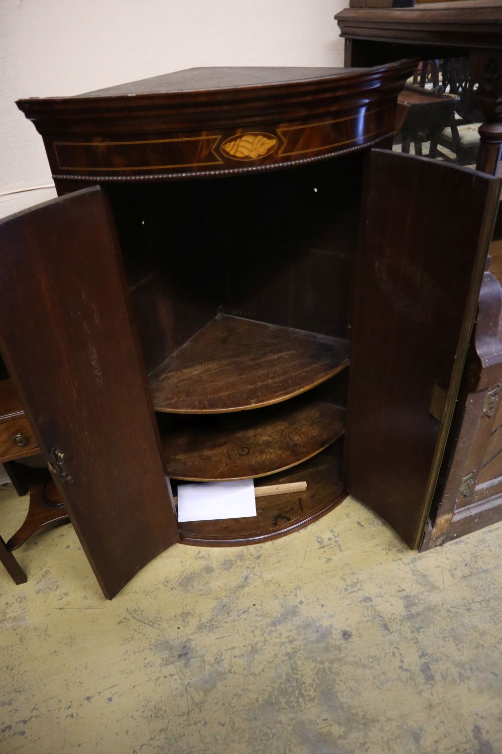 A George III inlaid mahogany bow-fronted hanging corner cupboard, having geometric line and shell - Image 2 of 2