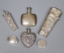 A 19th century embossed white metal etui (probably French) and five other small silver items,