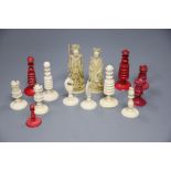 An ivory chess set and two other figures