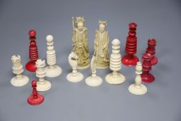 An ivory chess set and two other figures